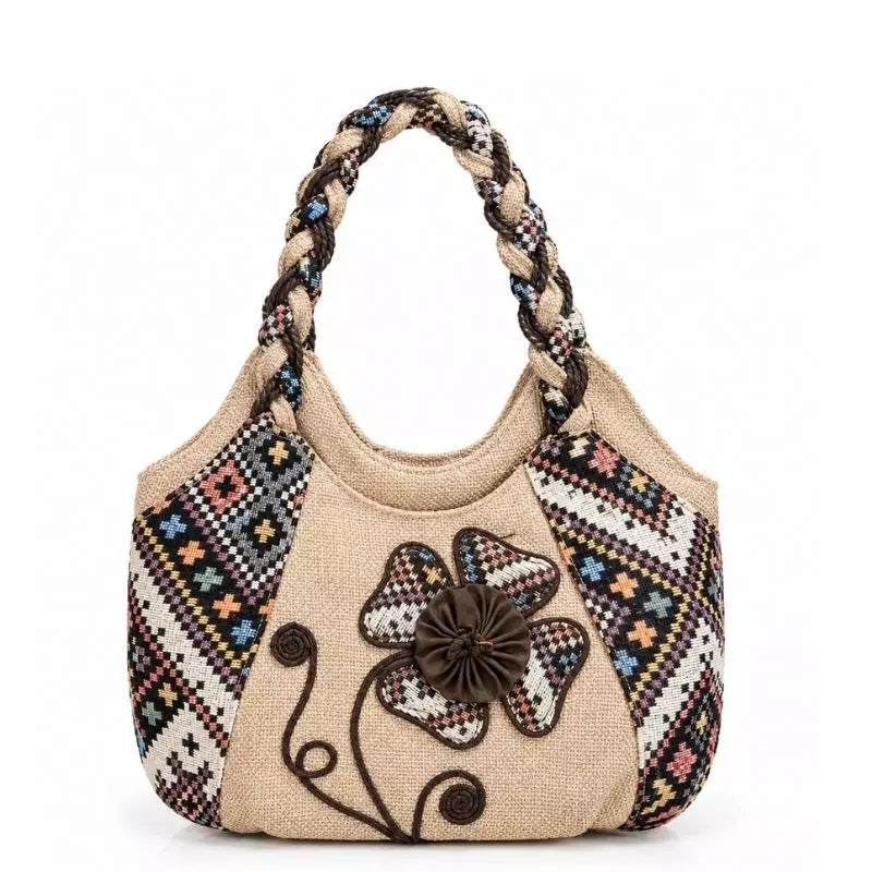 Bolsa de praia chique Lavinni Vintage Bloom com bordados florais retrô e alça trançada.
