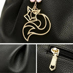 Detalhe do acabamento em couro da bolsa FOXER Saint Germain Black, Detalhe do fechamento em zíper da bolsa FOXER