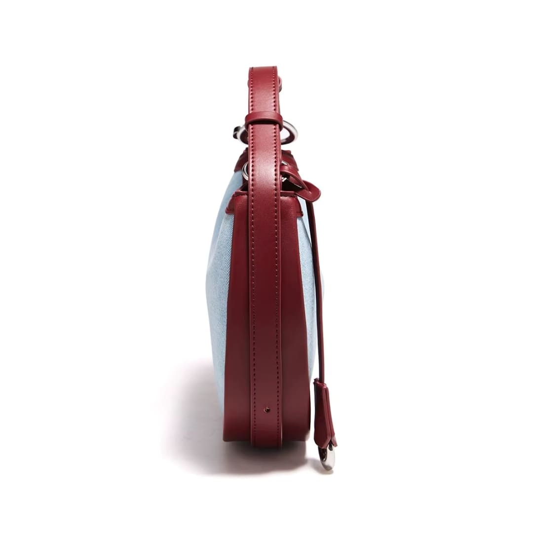 Bolsa FOXER Jeans Luxe vista lateral em jeans com acabamento em couro premium

